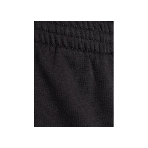 adidas Spodnie dresowe Essentials JF3567 Czarny Loose Fit S MODIVO
