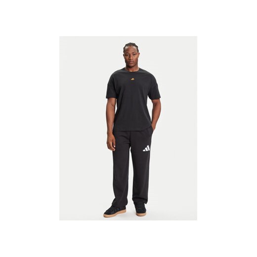 adidas Spodnie dresowe Essentials JF3567 Czarny Loose Fit XL MODIVO