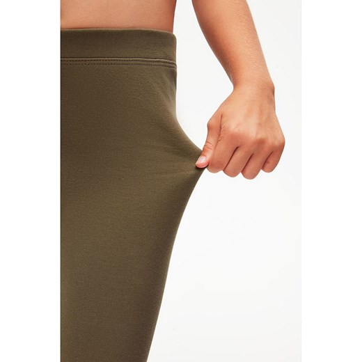 lovetti Legginsy w kolorze khaki Lovetti 122 wyprzedaż Limango Polska