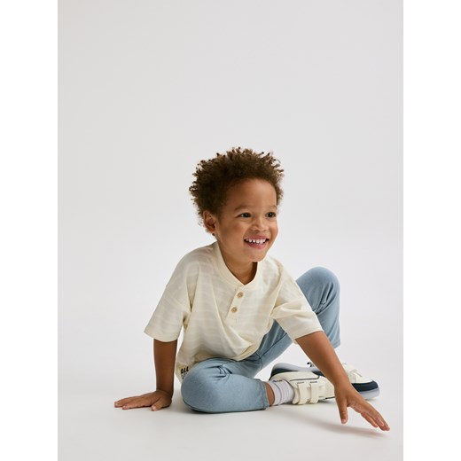 Reserved - Legginsy z efektem sprania - niebieski Reserved 98 (2-3 lata) Reserved