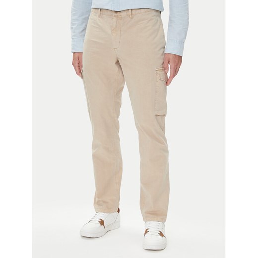 Tommy Hilfiger Spodnie materiałowe Denton MW0MW39695 Beżowy Straight Fit ze sklepu MODIVO w kategorii Spodnie męskie - zdjęcie 184928123