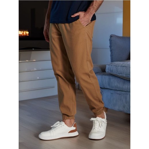 Sinsay - Spodnie jogger - beżowy ze sklepu Sinsay w kategorii Spodnie męskie - zdjęcie 184940732