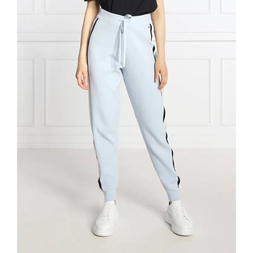 Tommy Hilfiger Spodnie dresowe | Regular Fit ze sklepu Gomez Fashion Store w kategorii Spodnie damskie - zdjęcie 184947951