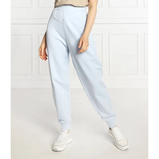 Tommy Hilfiger Spodnie dresowe | Relaxed fit ze sklepu Gomez Fashion Store w kategorii Spodnie damskie - zdjęcie 184948330