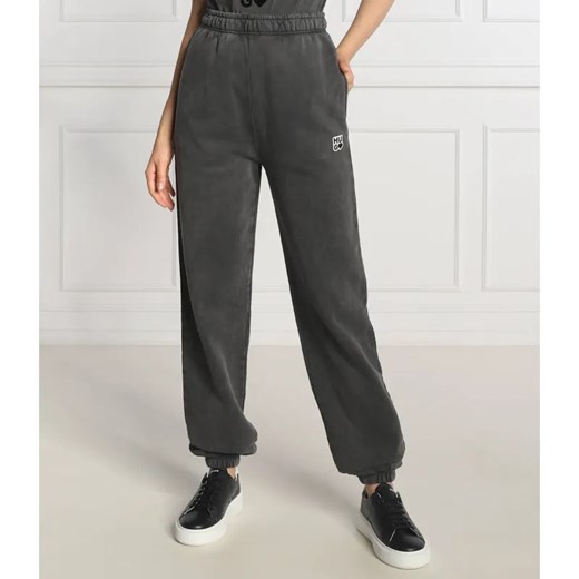 HUGO Spodnie dresowe Njola | Regular Fit ze sklepu Gomez Fashion Store w kategorii Spodnie damskie - zdjęcie 184948342