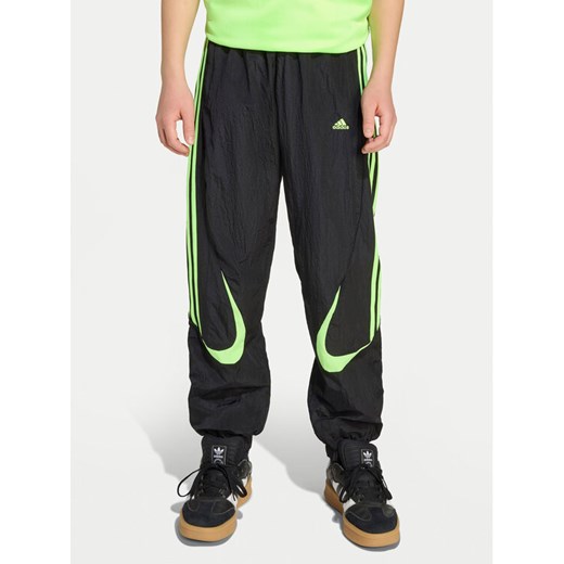 adidas Spodnie dresowe Teamgeist JY6321 Czarny Loose Fit ze sklepu MODIVO w kategorii Spodnie chłopięce - zdjęcie 184949760