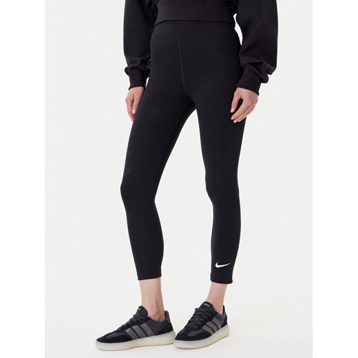 Nike Legginsy DV7789 Czarny Regular Fit ze sklepu MODIVO w kategorii Spodnie damskie - zdjęcie 184949831