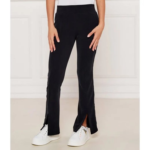 EA7 Spodnie dresowe | flare fit ze sklepu Gomez Fashion Store w kategorii Spodnie dziewczęce - zdjęcie 184959711