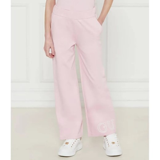 Guess Spodnie dresowe | flare fit ze sklepu Gomez Fashion Store w kategorii Spodnie dziewczęce - zdjęcie 184960054