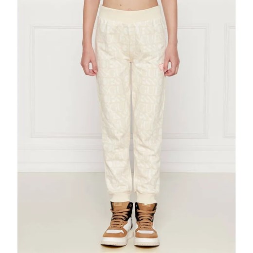 Guess Spodnie dresowe | Regular Fit ze sklepu Gomez Fashion Store w kategorii Spodnie dziewczęce - zdjęcie 184960074