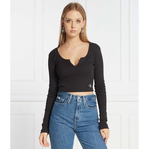 Calvin Klein Jeans Top SPLIT COLLAR RIB | Regular Fit ze sklepu Gomez Fashion Store w kategorii Bluzki damskie - zdjęcie 184971212