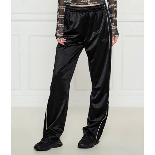 HUGO Spodnie dresowe Neannet | flare fit ze sklepu Gomez Fashion Store w kategorii Spodnie damskie - zdjęcie 185001654