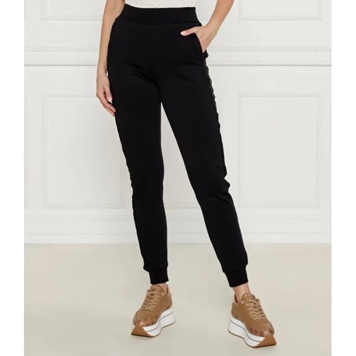 GUESS ACTIVE Spodnie dresowe | Regular Fit ze sklepu Gomez Fashion Store w kategorii Spodnie damskie - zdjęcie 185004842