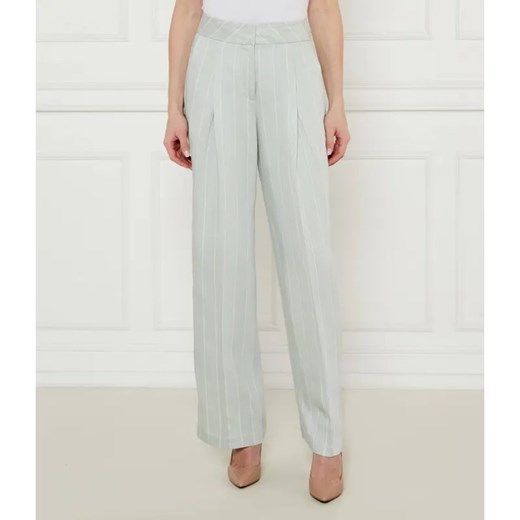 Marc Cain Spodnie WICHITA | flare fit | z dodatkiem lnu ze sklepu Gomez Fashion Store w kategorii Spodnie damskie - zdjęcie 185006062
