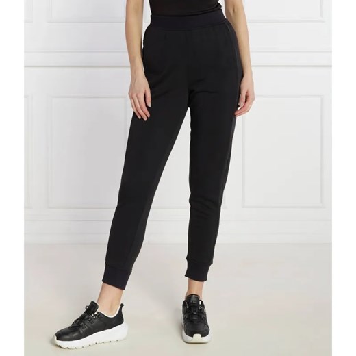 Calvin Klein Performance Spodnie dresowe | Regular Fit ze sklepu Gomez Fashion Store w kategorii Spodnie damskie - zdjęcie 185007690