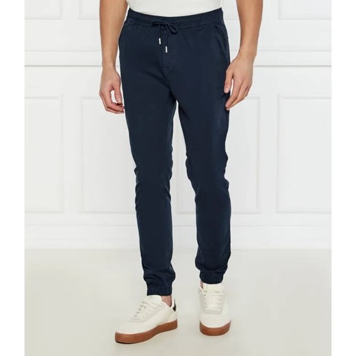 Tommy Jeans Spodnie jogger AUSTIN | Regular Fit ze sklepu Gomez Fashion Store w kategorii Spodnie męskie - zdjęcie 185008253