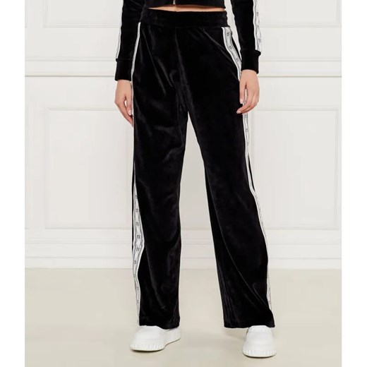 HUGO Spodnie dresowe Narhysan | flare fit ze sklepu Gomez Fashion Store w kategorii Spodnie damskie - zdjęcie 185008980