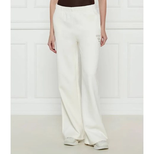 GUESS ACTIVE Spodnie dresowe ROBERTA | flare fit ze sklepu Gomez Fashion Store w kategorii Spodnie damskie - zdjęcie 185009503