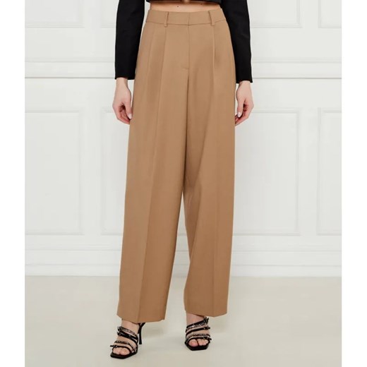 Michael Kors Spodnie | flare fit | z dodatkiem wełny ze sklepu Gomez Fashion Store w kategorii Spodnie damskie - zdjęcie 185009530