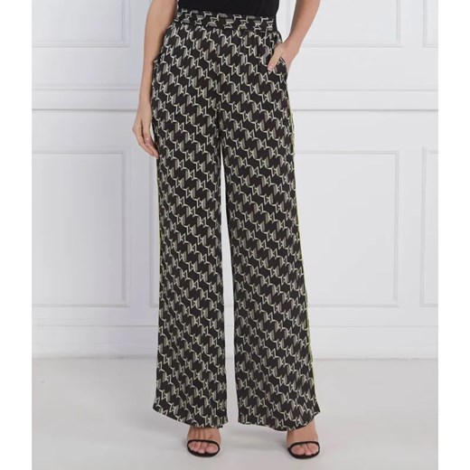 Karl Lagerfeld Spodnie PRINTED MONOGRAM | flare fit | high waist ze sklepu Gomez Fashion Store w kategorii Spodnie damskie - zdjęcie 185010603
