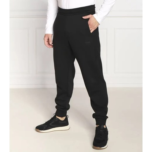 Calvin Klein Spodnie dresowe | Regular Fit ze sklepu Gomez Fashion Store w kategorii Spodnie męskie - zdjęcie 185010994