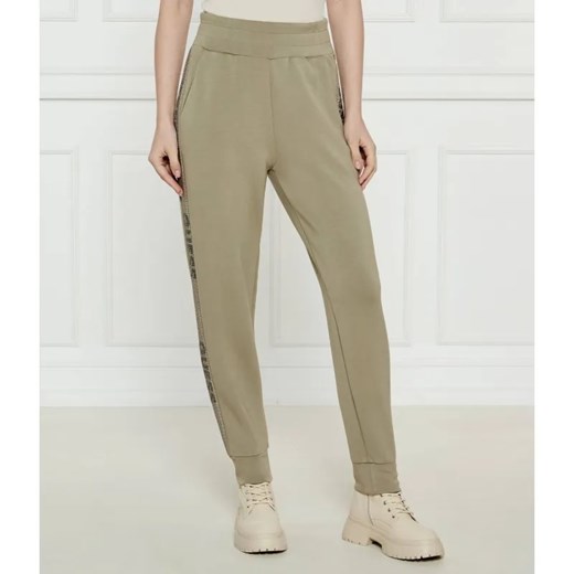 GUESS Spodnie dresowe VICTOIRE | Regular Fit ze sklepu Gomez Fashion Store w kategorii Spodnie damskie - zdjęcie 185011791