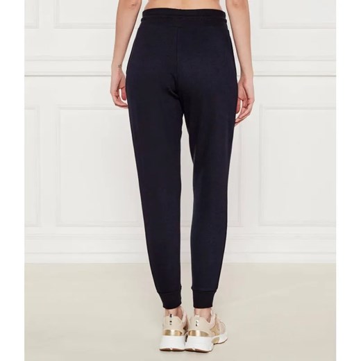 Tommy Hilfiger Spodnie dresowe | Regular Fit ze sklepu Gomez Fashion Store w kategorii Spodnie damskie - zdjęcie 185012101