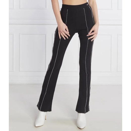 Tommy Jeans Spodnie SEAM DETAIL | flare fit ze sklepu Gomez Fashion Store w kategorii Spodnie damskie - zdjęcie 185013020
