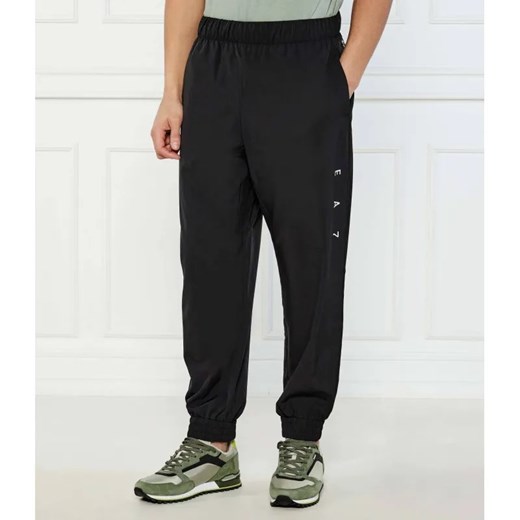 EA7 Spodnie dresowe | Modern fit ze sklepu Gomez Fashion Store w kategorii Spodnie męskie - zdjęcie 185013392
