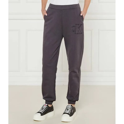 Calvin Klein Jeans Spodnie dresowe | Regular Fit ze sklepu Gomez Fashion Store w kategorii Spodnie damskie - zdjęcie 185013892
