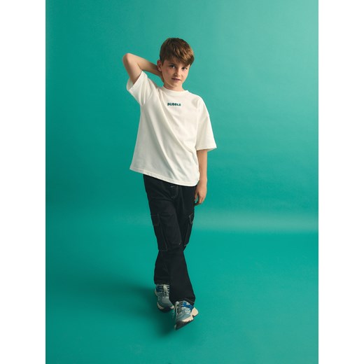 Reserved - Spodnie z kontrastowymi przeszyciami - czarny Reserved 146 (10 lat) Reserved