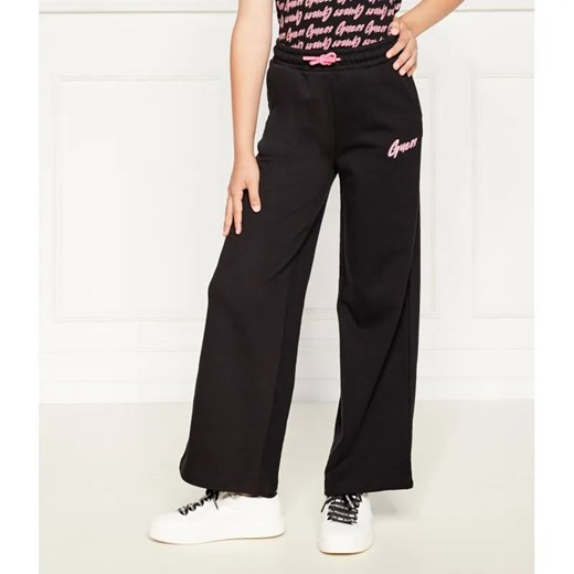 Guess Spodnie dresowe | Regular Fit ze sklepu Gomez Fashion Store w kategorii Spodnie dziewczęce - zdjęcie 185028870