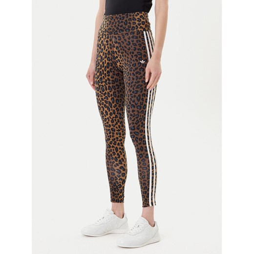 adidas Legginsy Leopard 3-Stripes JW7308 Brązowy Slim Fit ze sklepu MODIVO w kategorii Spodnie damskie - zdjęcie 185040800