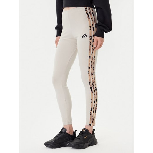 adidas Legginsy Animal Print 3-Stripes JM1867 Beżowy Slim Fit ze sklepu MODIVO w kategorii Spodnie damskie - zdjęcie 185040831
