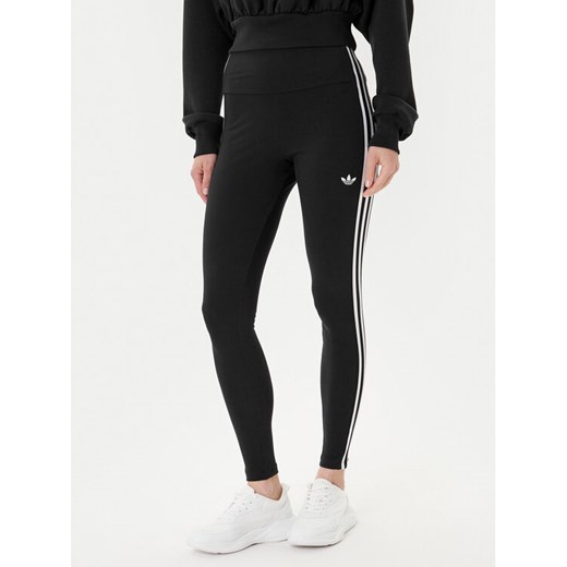 adidas Legginsy adicolor 3-Stripes JX5242 Szary Slim Fit ze sklepu MODIVO w kategorii Spodnie damskie - zdjęcie 185040841
