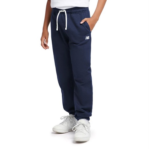 Spodnie dziecięce New Balance LAKB0060NNY - granatowe ze sklepu streetstyle24.pl w kategorii Spodnie chłopięce - zdjęcie 185057321