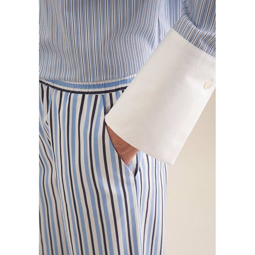 Seidensticker Spodnie w kolorze błękitno-biało-granatowym Seidensticker 40 promocja Limango Polska