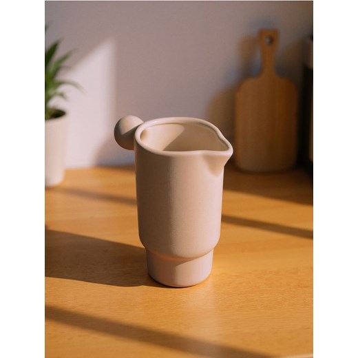 Sinsay - Ceramiczny wazon z okrągłym uchwytem - kremowy ze sklepu Sinsay w kategorii Wazony - zdjęcie 185087183