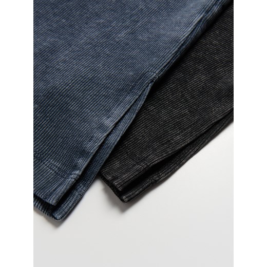 Reserved - Legginsy flare z rozcięciem - czarny Reserved 140 (9 lat) Reserved