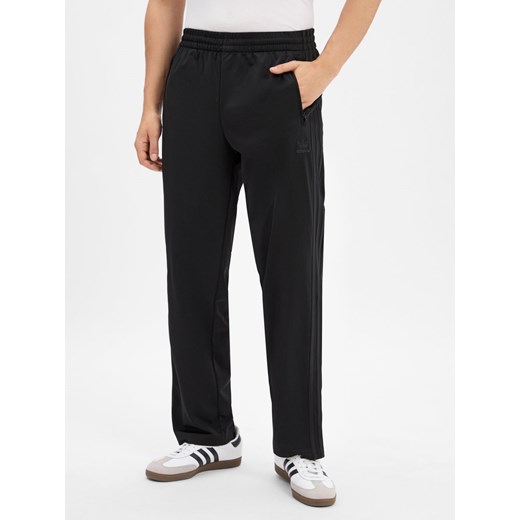 adidas Originals Męskie spodnie dresowe - Firebird Mężczyźni czarny jednolity ze sklepu vangraaf w kategorii Spodnie męskie - zdjęcie 185362763