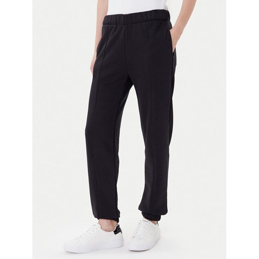 On Spodnie dresowe Club Pants 1WE1005 Czarny Relaxed Fit ze sklepu MODIVO w kategorii Spodnie damskie - zdjęcie 185391170