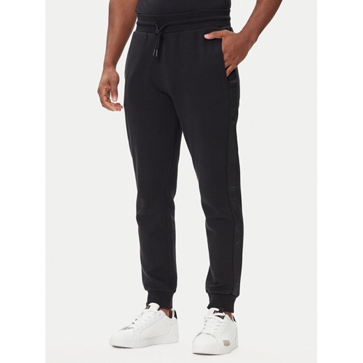 Emporio Armani Underwear Spodnie dresowe EM000500 AF14976 UC001 Czarny Regular Fit ze sklepu MODIVO w kategorii Spodnie męskie - zdjęcie 185391263