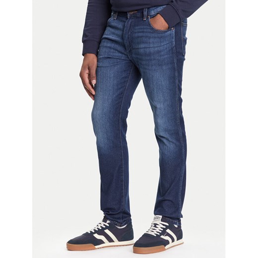 Wrangler Jeansy Larston 112372934 Granatowy Slim Fit ze sklepu MODIVO w kategorii Jeansy męskie - zdjęcie 185391393
