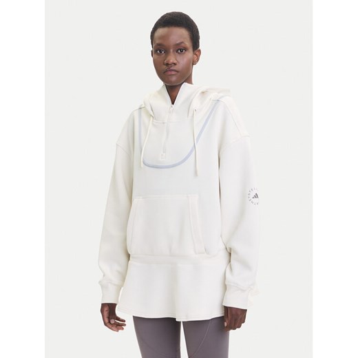 adidas by Stella McCartney Bluza Peplum JX9108 Beżowy Loose Fit ze sklepu MODIVO w kategorii Bluzy damskie - zdjęcie 185391600
