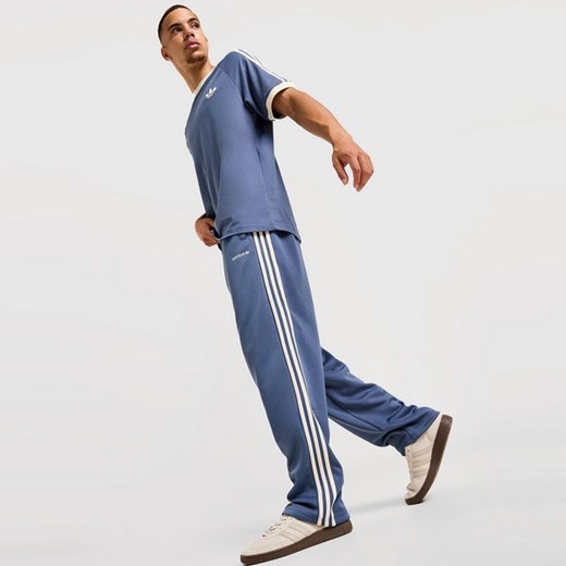 ADIDAS SPODNIE FIRST PANT ze sklepu JD Sports  w kategorii Spodnie męskie - zdjęcie 185408244