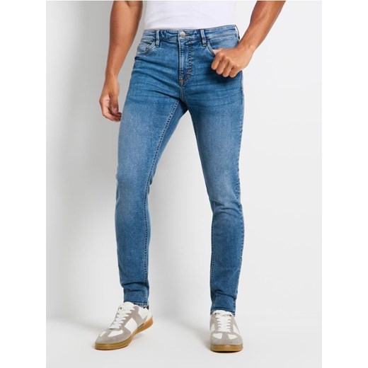 Sinsay - Jeansy SUPER SKINNY - niebieski Sinsay 28/30 okazyjna cena Sinsay