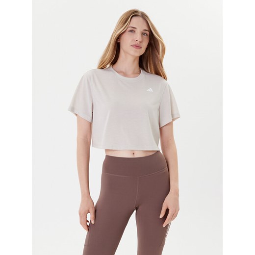 adidas Koszulka techniczna Train Essentials JE6169 Beżowy Loose Fit ze sklepu MODIVO w kategorii Bluzki damskie - zdjęcie 185415951