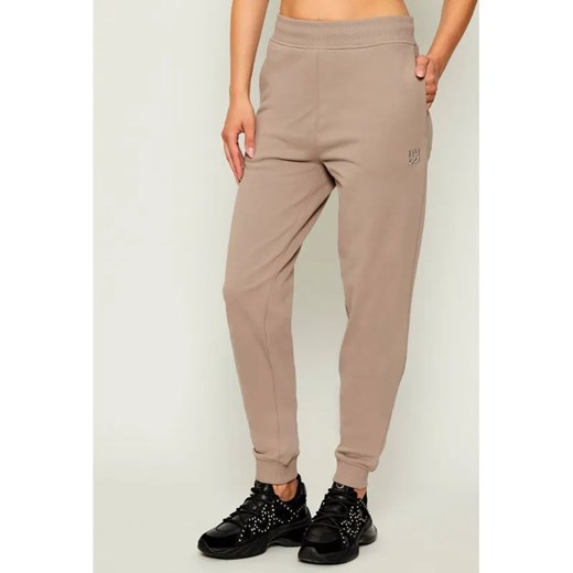 HUGO Spodnie dresowe Nelfinia | Regular Fit ze sklepu Gomez Fashion Store w kategorii Spodnie damskie - zdjęcie 185440631