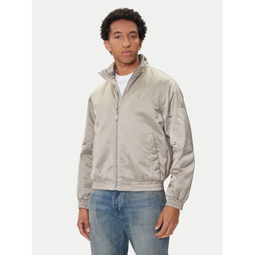 Calvin Klein Jeans Kurtka bomber Harrington LV04RC516G Beżowy Regular Fit ze sklepu MODIVO w kategorii Kurtki męskie - zdjęcie 185444060