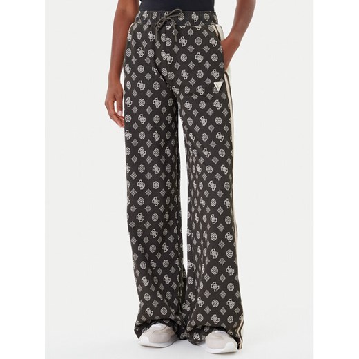 Guess Spodnie dresowe V5YB10 K0282 Zielony Relaxed Fit ze sklepu MODIVO w kategorii Spodnie damskie - zdjęcie 185444080